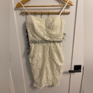 White sparkly prom dress, with pockets, NEVER WORN and includes tag